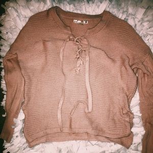 Pale pink lace up sweater
